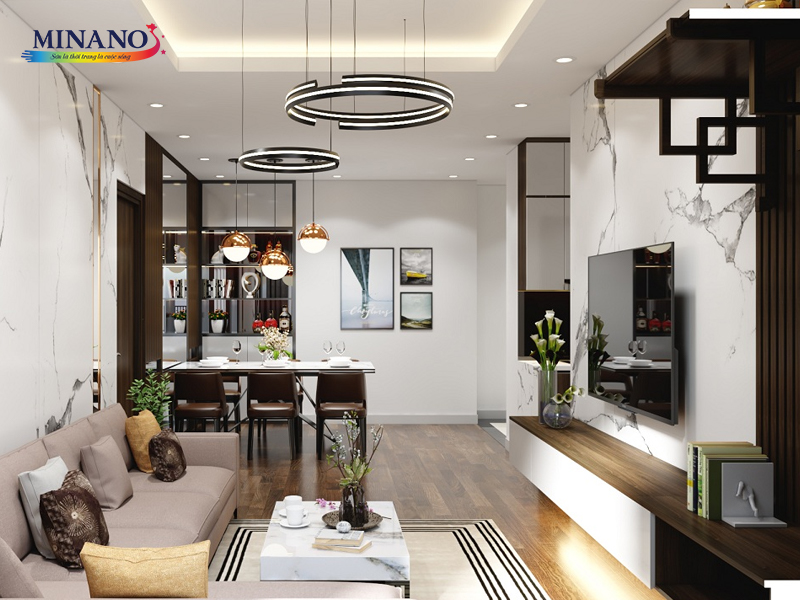 Bức tranh mô tả một phòng khách tinh tế và đẳng cấp với tường được sơn giả đá. Hiệu ứng giả đá tạo nên vẻ đẹp tự nhiên và sang trọng trong không gian