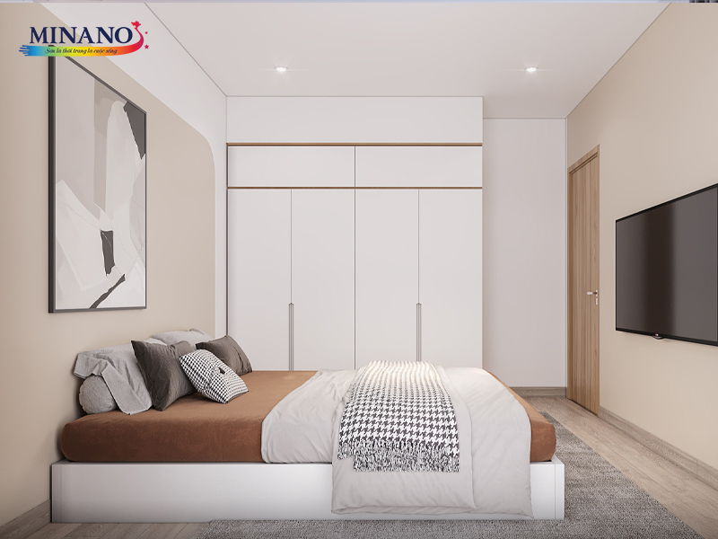 Bức tranh phòng ngủ tràn đầy ấm áp với gam màu kem êm dịu. Tường phòng được sơn màu kem nhạt, tạo nền cho không gian tĩnh lặng và thư thái