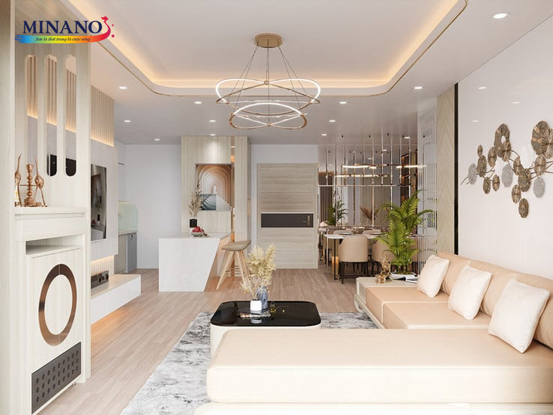 phòng khách ấm áp và dịu dàng với tone màu kem làm chủ đạo. Màu kem tạo cảm giác thoải mái và ấm áp trong không gian