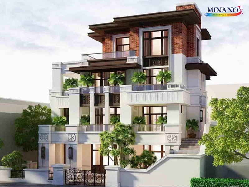 Tone màu trắng chủ đạo kết hợp cùng màu cam gạch rực rỡ cho biệt thự 4 tầng, tạo điểm nhấn và sự phá cách cho kiến trúc